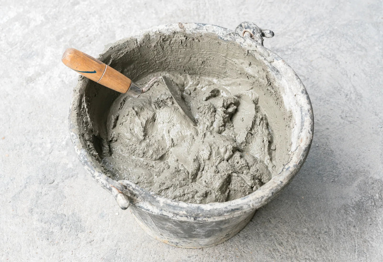 Bucket and trowel ready for a commercial concrete pour