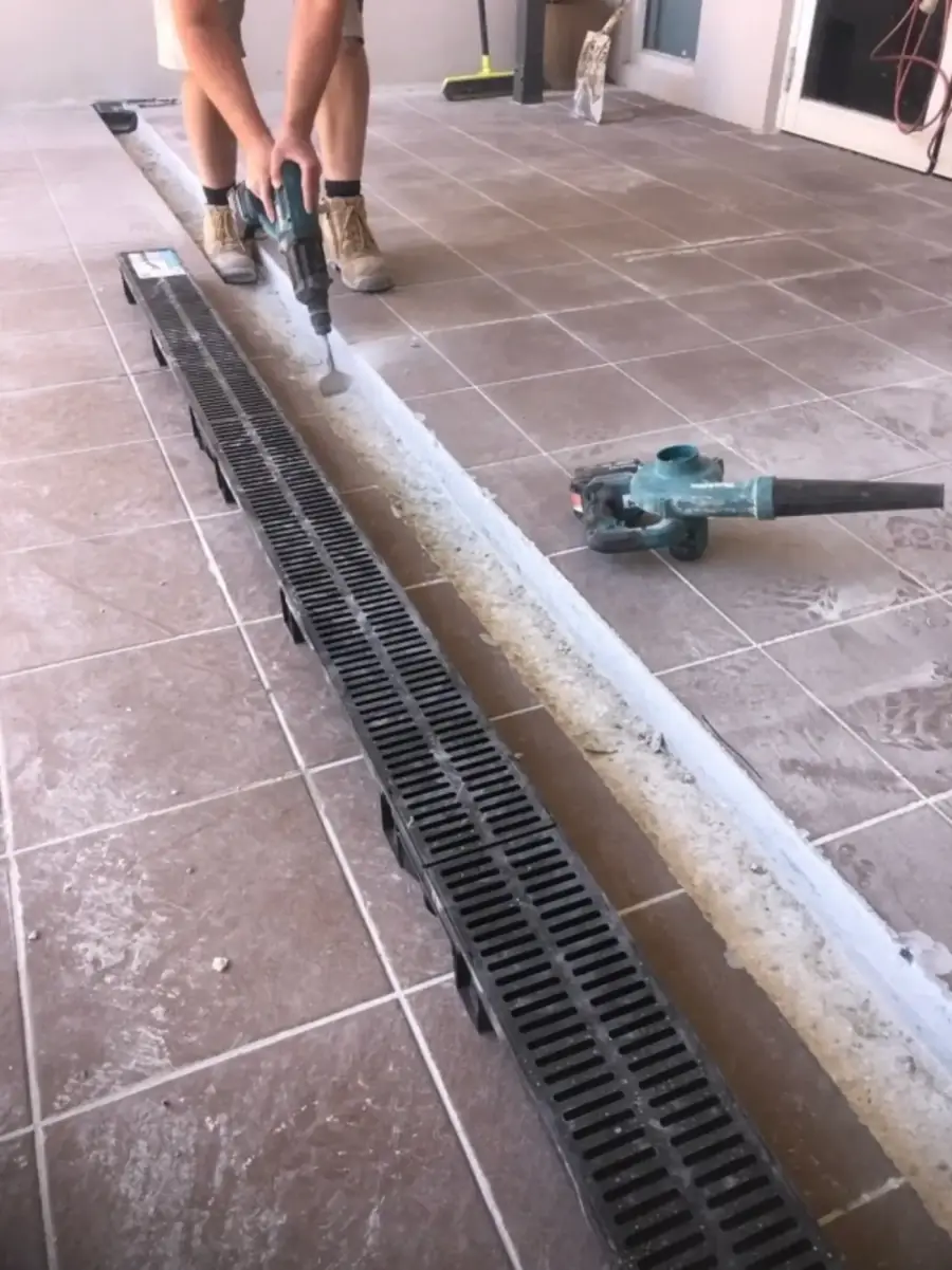 Commercial tile flooring and drainage install